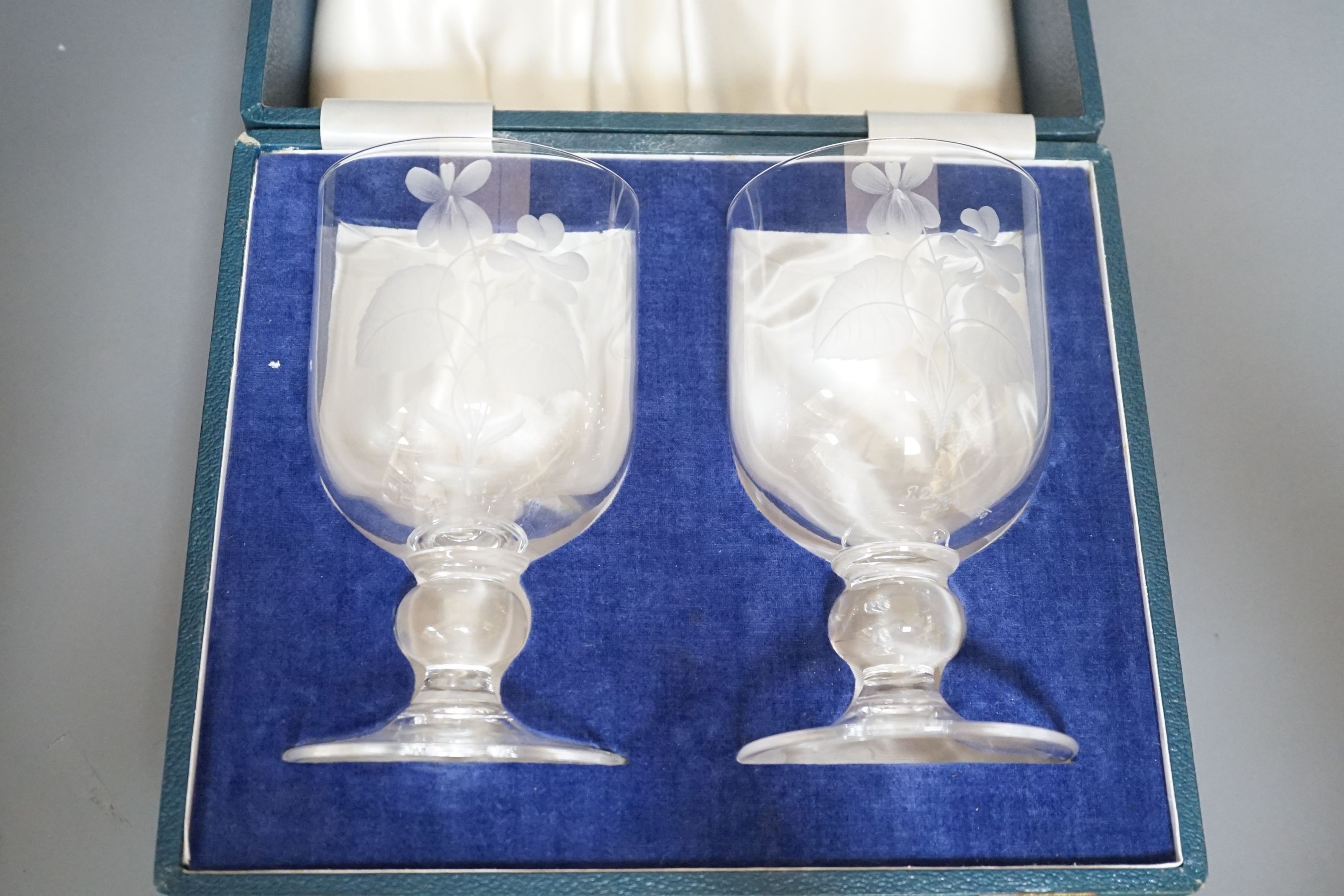A cased pair of Peter Dreiser wheel etched glasses. Signed and dated 1971. 15cm